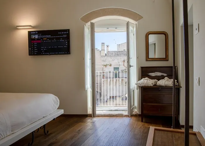 L'artiere Dimore Nei Sassi 4*